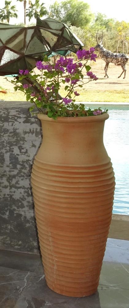 Terracotta vase width 40 cm, depth 50 cm Height 63 cm 